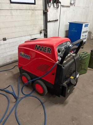 we are looking at a welder machine in a garage