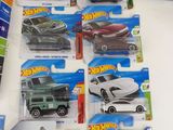a lot of hot wheels cars on display in the store