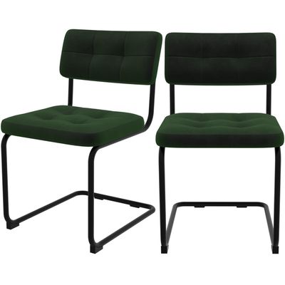 deux chaises vertes avec des pieds en métal et une structure noire