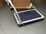 a cart that is sitting in the middle of a room