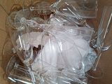 a cardboard box with a bunch of empty wine glasses in it