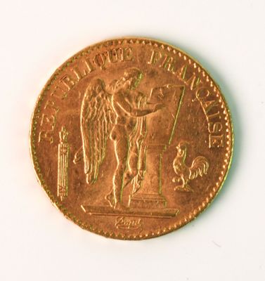 a gold coin with a picture of an angel on it