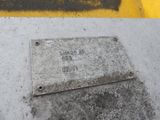 a plaque on the side of a building that says honor us