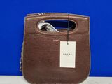 an image of a brown purse with a tag on it