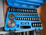 a blue tool box with a bunch of tools inside of it