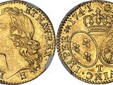 a gold sovereign coin with a woman ' s head and a crown on it