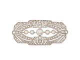 an art deco diamond and pearl broochle
