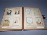 an old book with a bunch of pictures on it