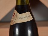 a bottle of wine that is sitting on a table
