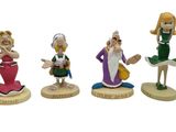 five figurines of different characters on a white background