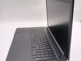 a laptop that is sitting on a white table