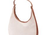 un sac à main blanc avec des anses marron sur fond blanc