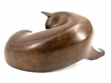 a wooden sculpture of a cat on a white background