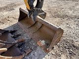 a close up view of a construction vehicle ' s front end