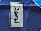 blue, yellow, and orange squares with a monogram ysl on it