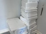 a stack of plastic containers stacked on top of each other