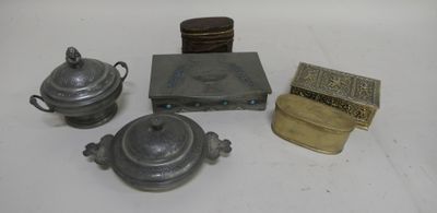 several different types of silverware are displayed on a white surface