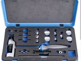 a blue case with tools in it on a white background