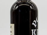 a bottle of wine that is sitting on a table