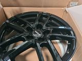 a close up of a box with a wheel inside of it