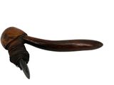 an image of a wooden pipe with a black handle on a white background