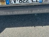 a close up of a license plate on the back of a car
