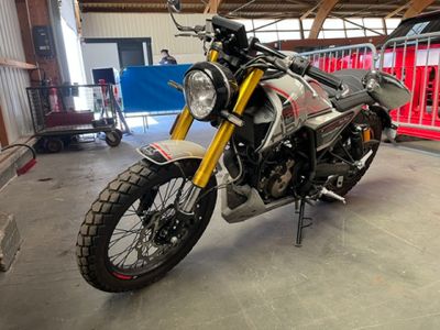 a motorcycle that is parked in a garage