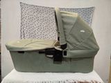 a baby stroller that is sitting on top of a table