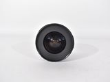 an image of a close up of a camera lens on a white surface