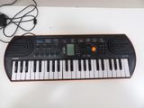 a keyboard that is sitting on top of a table
