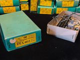 many boxes of electrical equipment sitting on a table