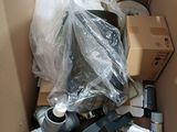 a cardboard box filled with assorted items in it