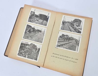 an open book with pictures of trains on the pages