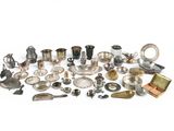 a lot of silver items that are on the table