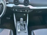 the interior of a car with a steering wheel and dashboard controls