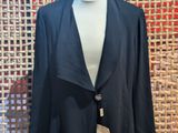 a woman ' s jacket on a mannequin mannequin mannequin mannequin mannequin mannequin mannequin mannequin mann