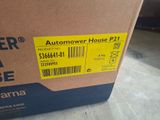 a box with a yellow label on it sitting on the floor