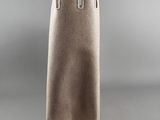 a beige tote bag sitting on top of a table
