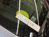 a sticker on the windshield of a car that says paulito