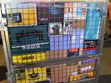 a large metal cage with many items in it