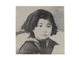 an old black and white photo of a young girl in a sailor ' s outfit