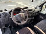 a car dashboard with a steering wheel and a dash board