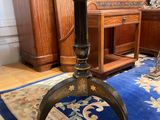 a blue rug on the floor next to a wooden table