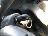 a close up view of a car ' s steering handle