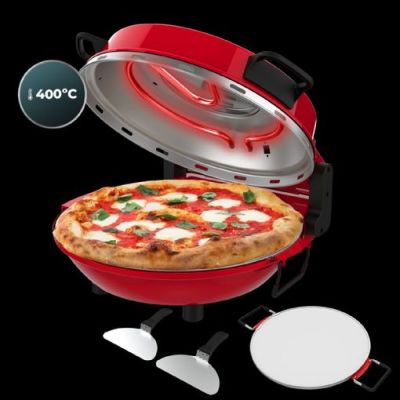 a pizza that is being cooked in a red grill