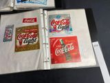 a binder with a coca cola light sticker on it