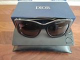 Lunettes de soleil Christian Dior dans leur étui