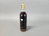 a bottle of wine that is sitting on a table