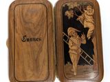 a wooden box with a picture of a man and a woman on it