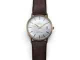 an image of a close up of a wrist watch on a white surface